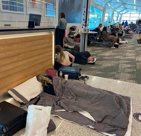  Brits ‘abandoned’ on airport floor after London flight diverts to Bermuda