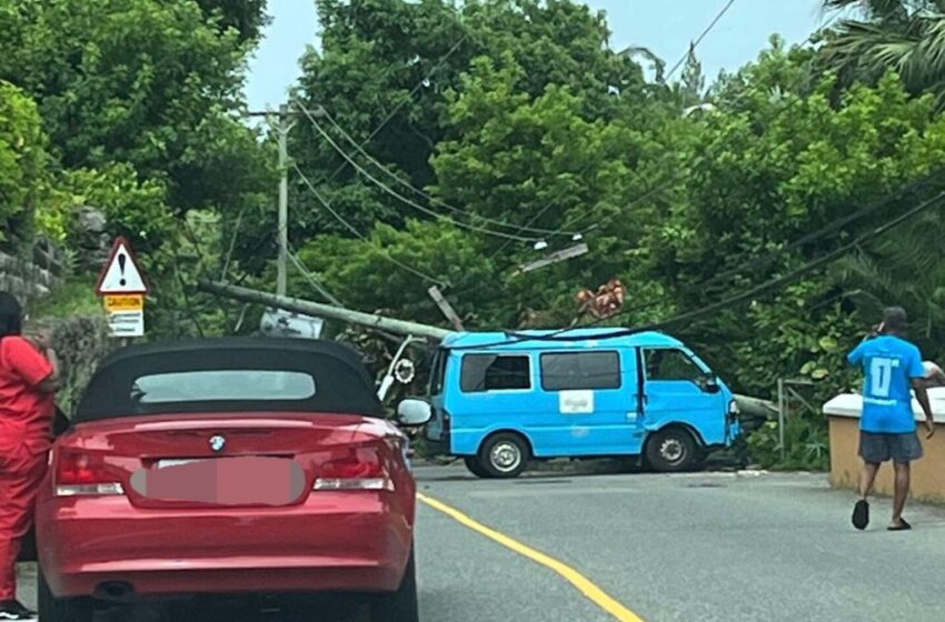  Power outages after van crashes into utility pole