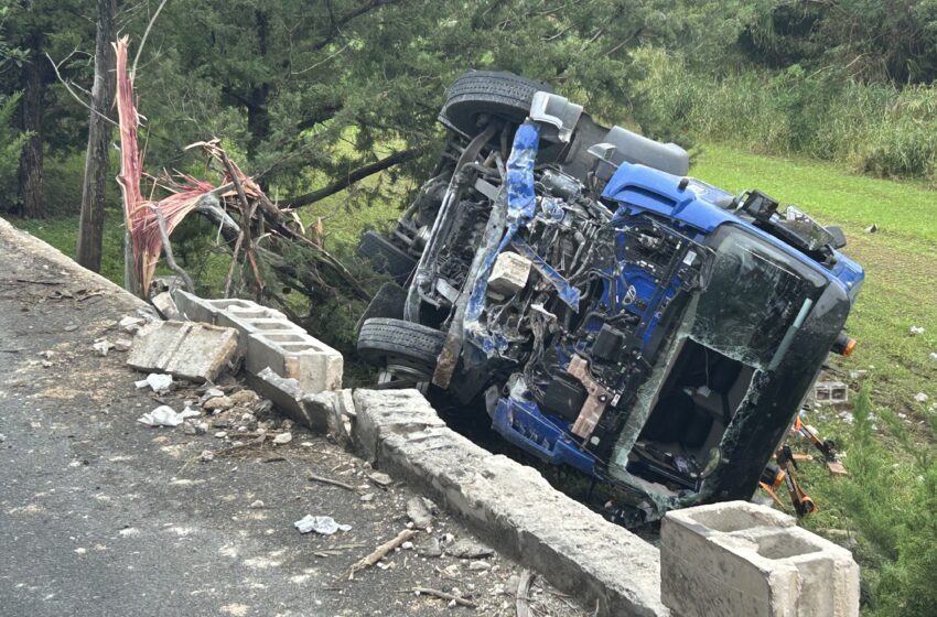  Trash Truck Crashes in Paget Area, Three Workers Injured